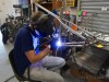 Todd Heath puts torch to titanium as he works to finish a Moonmen frame in time for Single Speed Worlds.
