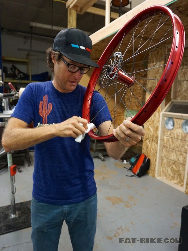 Ryan works on a wheels for Single Speed Worlds.