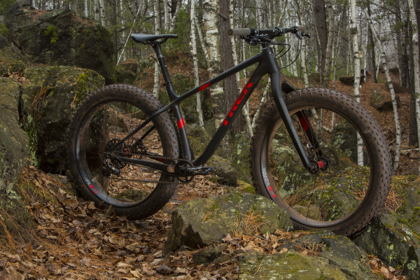 The Trek Farley 9.8 proudly straddles some of the Cuyuna Iron Range's boulders from the original days of the mining industry in this land of red dirt.