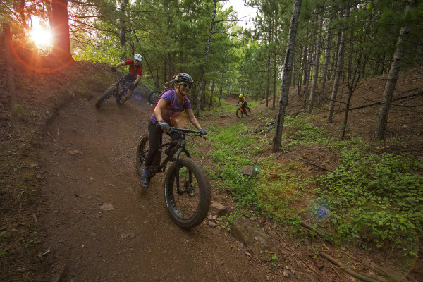 Enough standing around camp. Shred the red. Within seconds of the yurts are a few of Cuyuna's flagship trails including Bob Sled (as seen here), Timber Shaft (expert technical terrain) and Haul Road (Beginner fun fest).