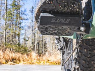 studded boot on rubber pedal